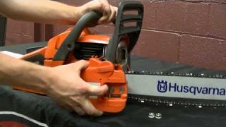 How to Remove a Chainsaw Clutch Cover and Reset the Chain Brake